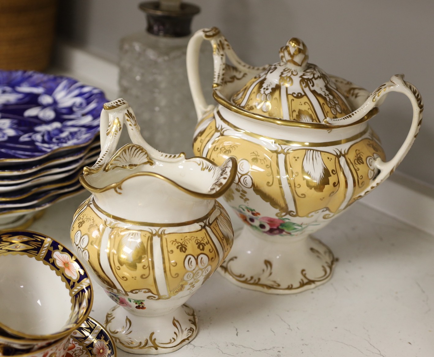 A selection of mixed 19th century ceramics, to include A Wedgwood aesthetic period part dessert service, Royal Crown Derby tea ware, a silver mounted decanter, etc.